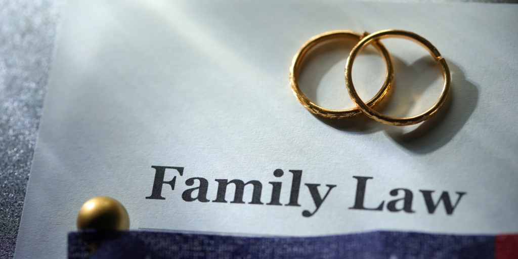 Image of wedding rings on a Family Law document